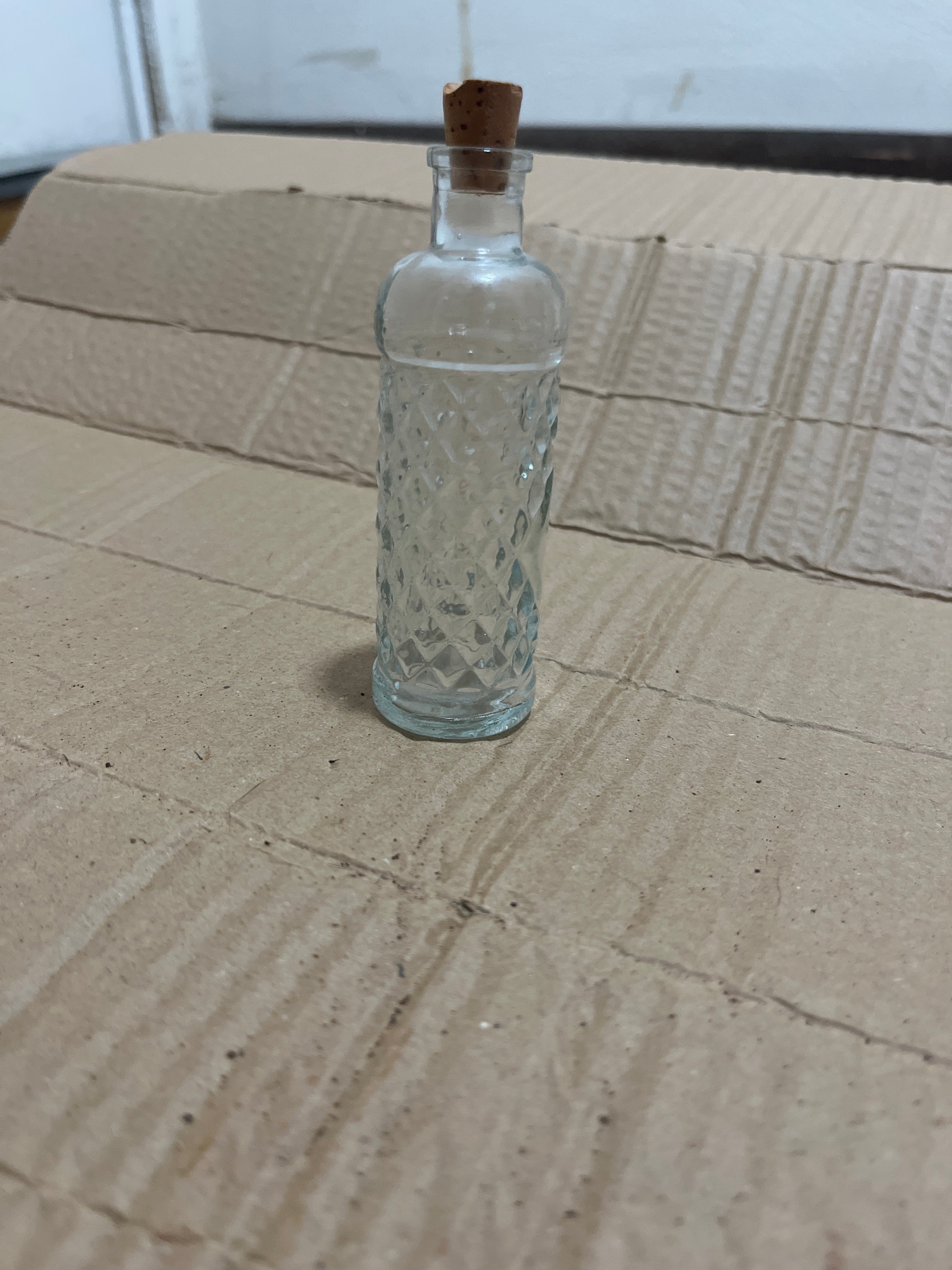 Mini glass bottle